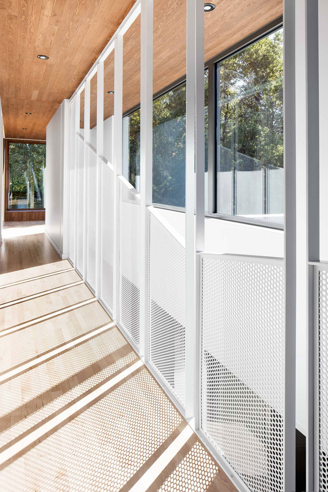 A Contemporary Home Combines Wood and Steel Panelling in Rimouski by NatureHumaine (14)