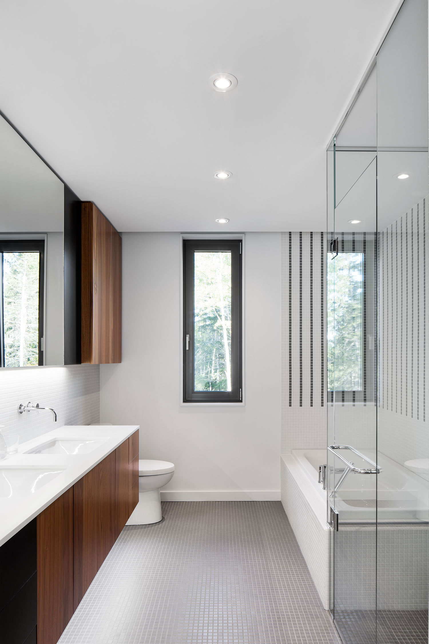 A Contemporary Home Combines Wood and Steel Panelling in Rimouski by NatureHumaine (15)