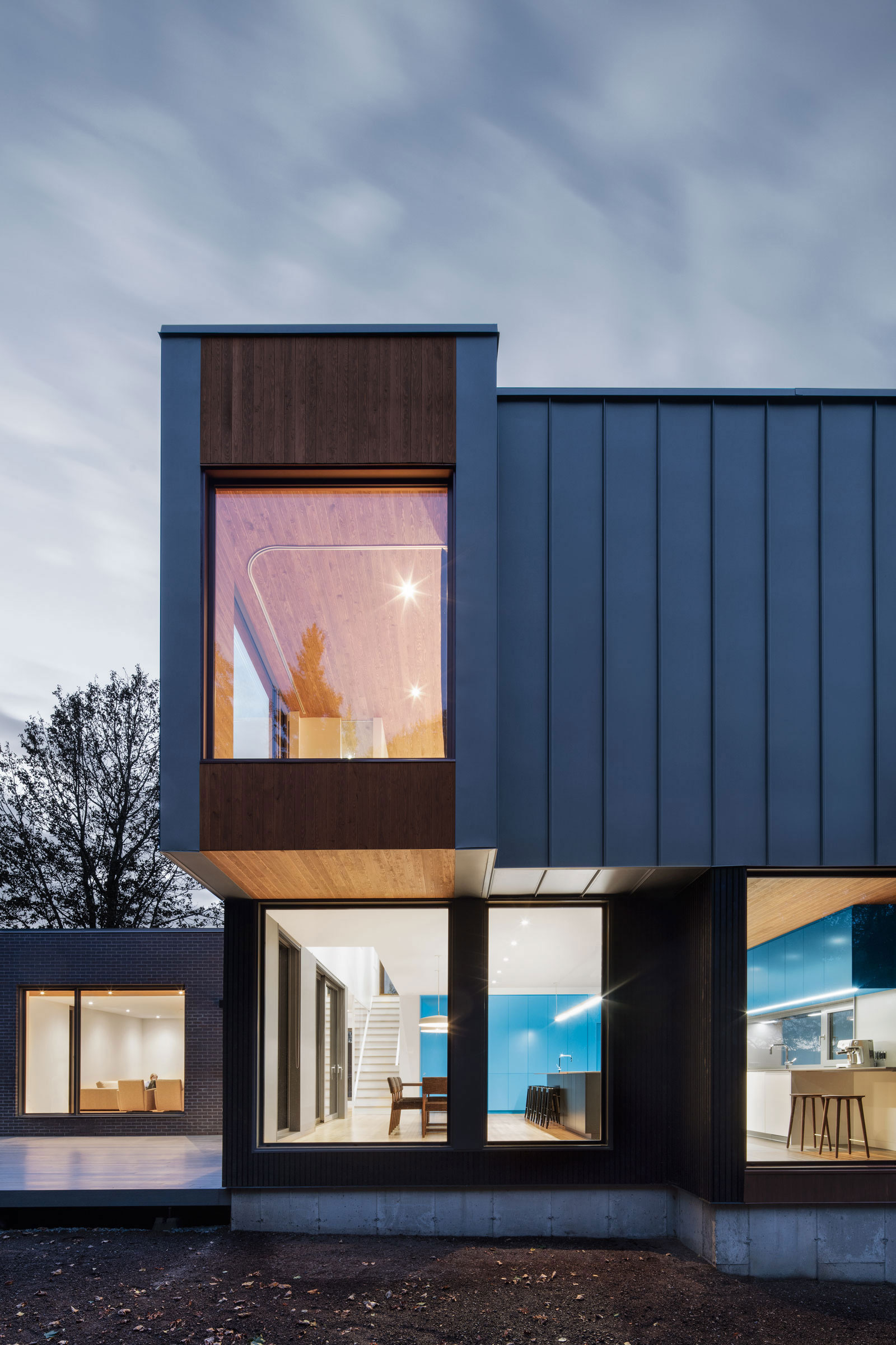 A Contemporary Home Combines Wood and Steel Panelling in Rimouski by NatureHumaine (3)