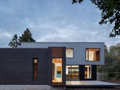 A Contemporary Home Combines Wood and Steel Panelling in Rimouski by NatureHumaine (4)