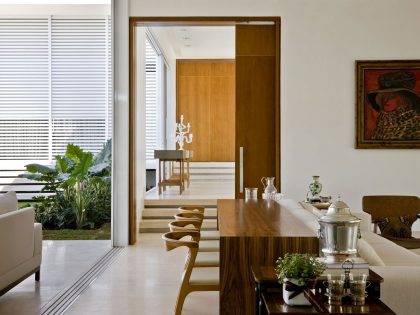 A Contemporary Home Composed by Streamlined Structure with Eclectic Interiors in Goiania by Leo Romano (12)