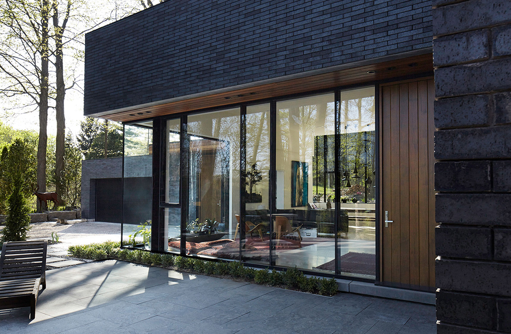 A Stylish Modern Dark Brick Home in the Lush Forests of Dundas, Ontario by Setless Architecture (5)