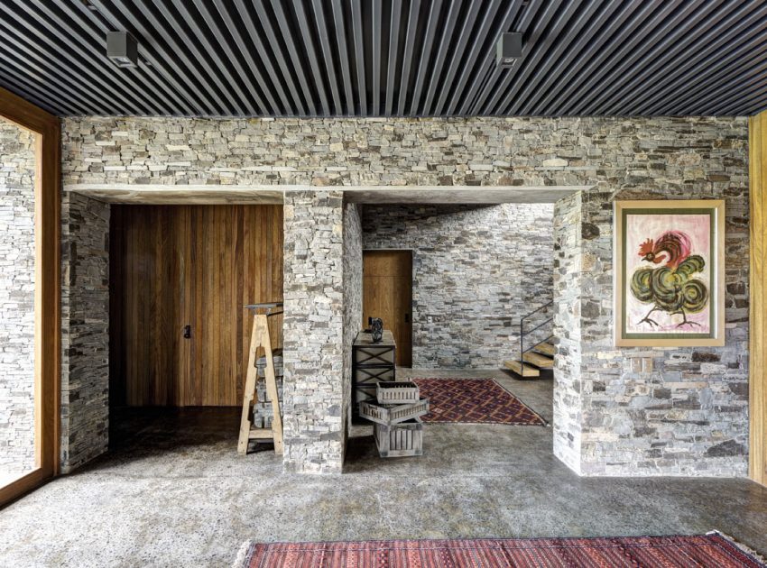 A Contemporary Home with Rustic Elements of Wood and Stone in Mexico by Elías Rizo Arquitectos (12)