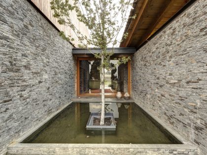 A Contemporary Home with Rustic Elements of Wood and Stone in Mexico by Elías Rizo Arquitectos (7)