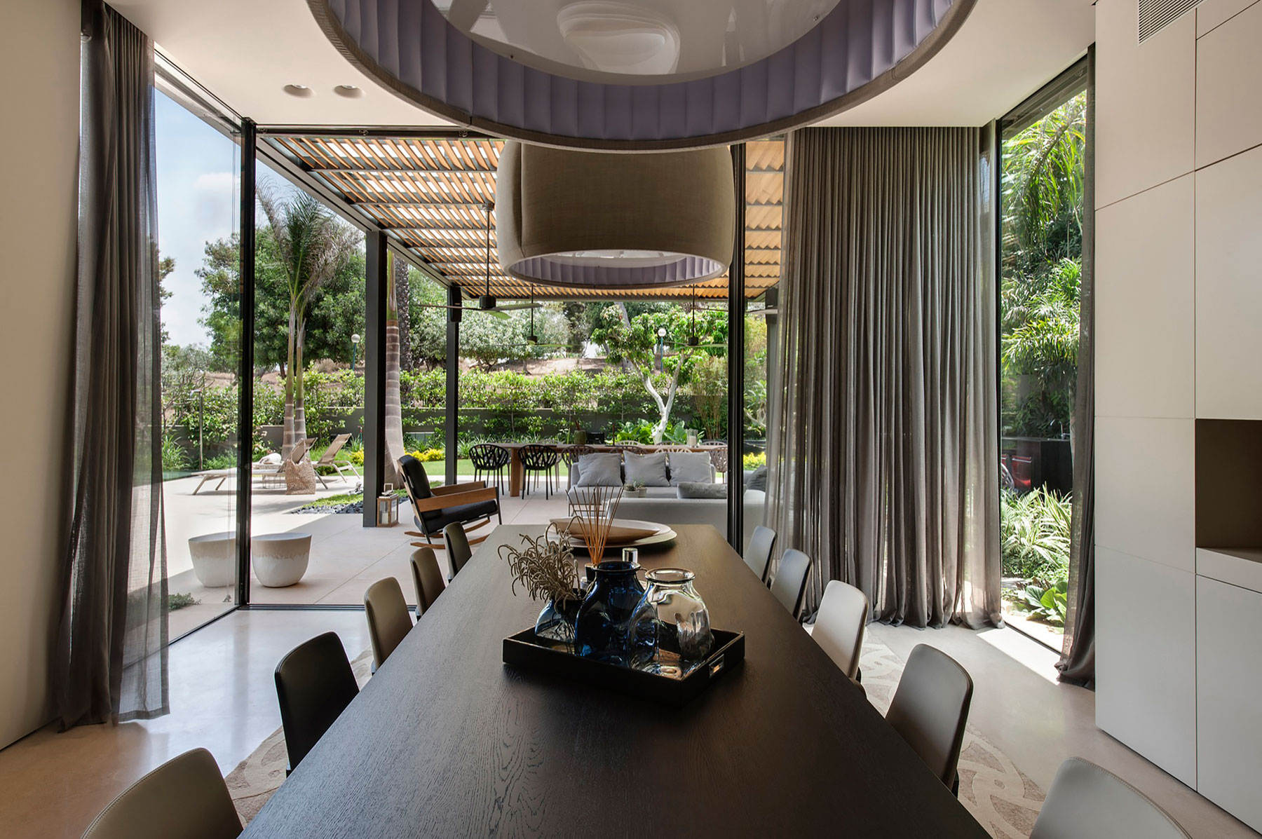A Contemporary Home with Sliding Glass Doors and Green Stone Pool in Israel by Eran Binderman & Rama Dotan (16)