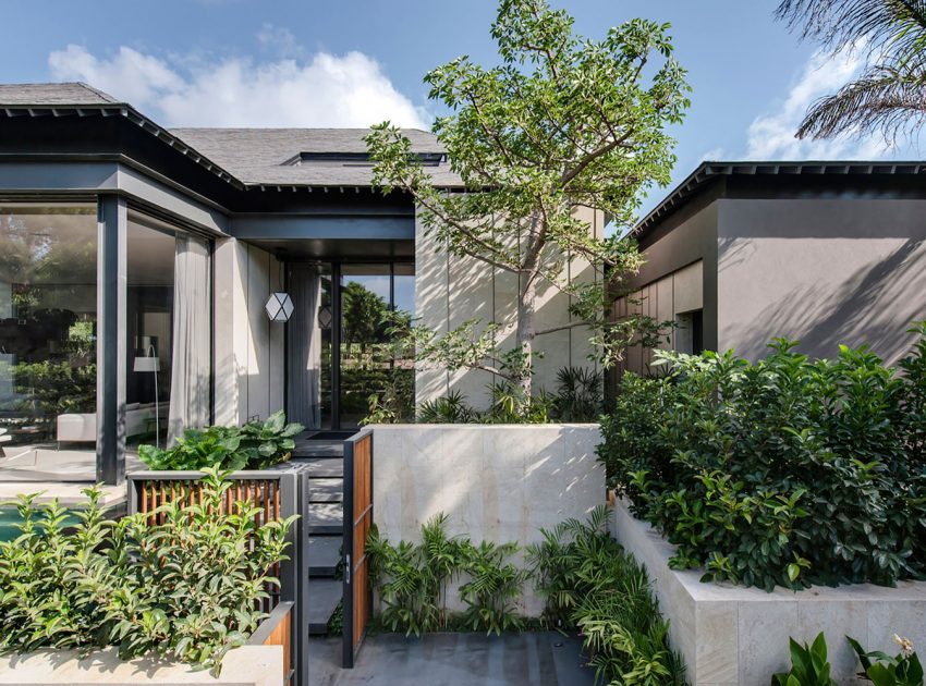 A Contemporary Home with Sliding Glass Doors and Green Stone Pool in Israel by Eran Binderman & Rama Dotan (2)