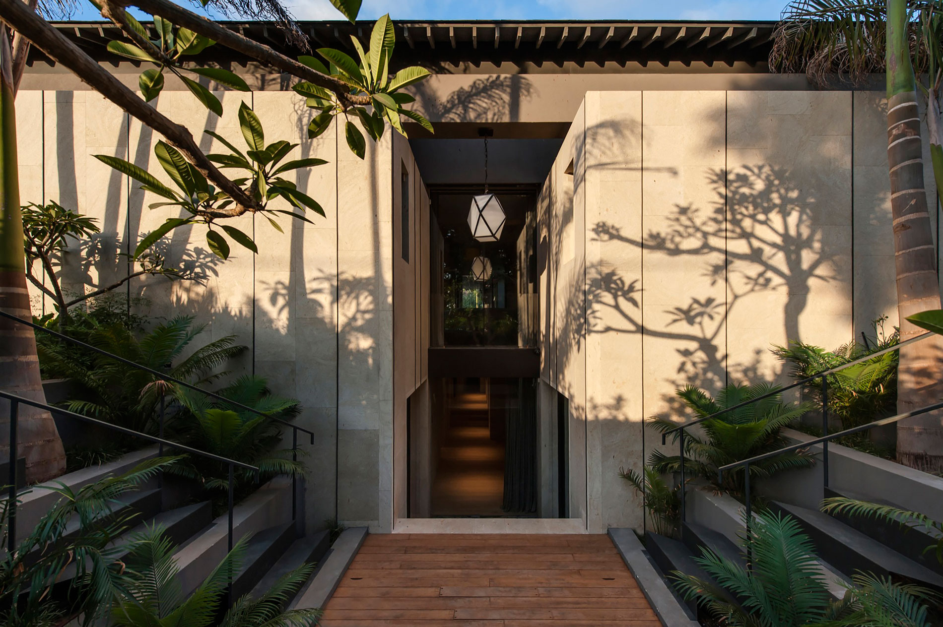 A Contemporary Home with Sliding Glass Doors and Green Stone Pool in Israel by Eran Binderman & Rama Dotan (5)