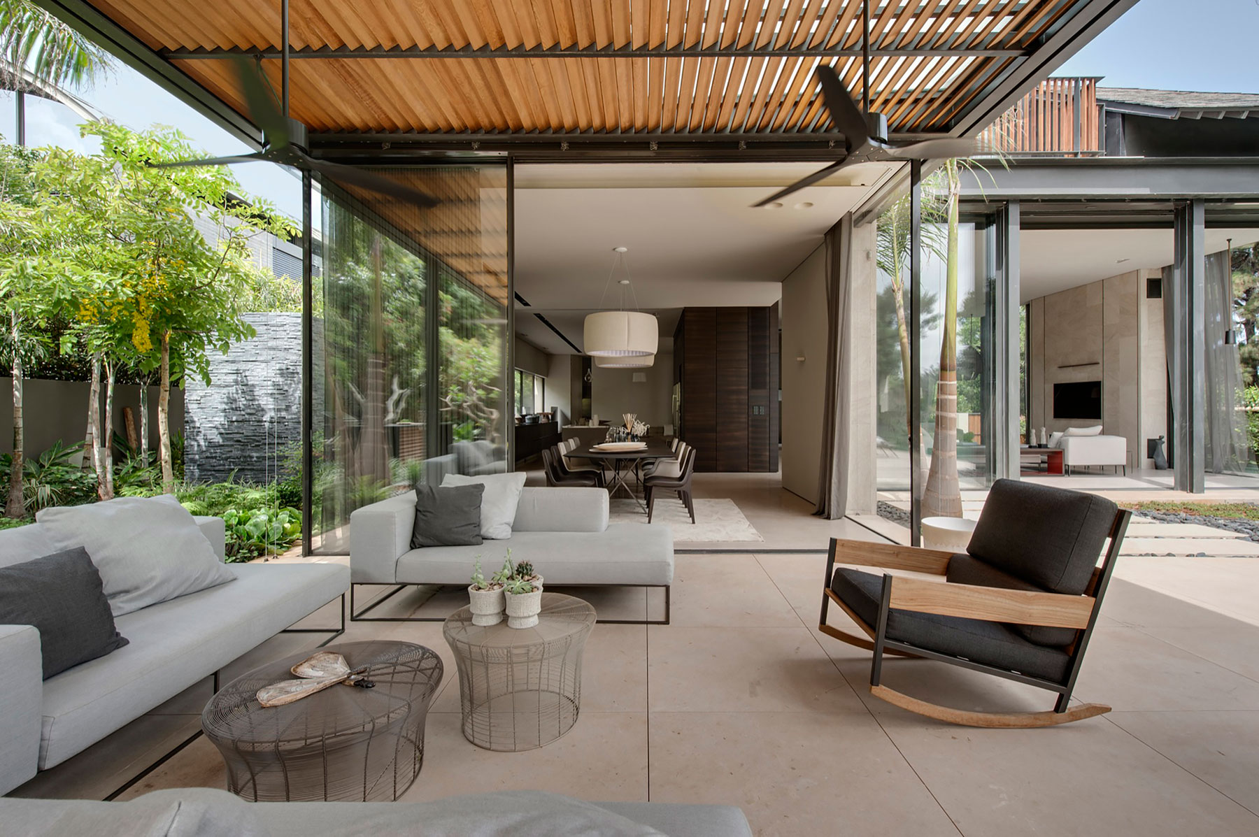 A Contemporary Home with Sliding Glass Doors and Green Stone Pool in Israel by Eran Binderman & Rama Dotan (9)