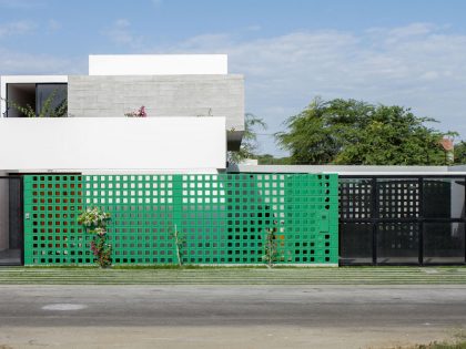A Stunning Contemporary House with Green Walls Made of Concrete Blocks in Piura