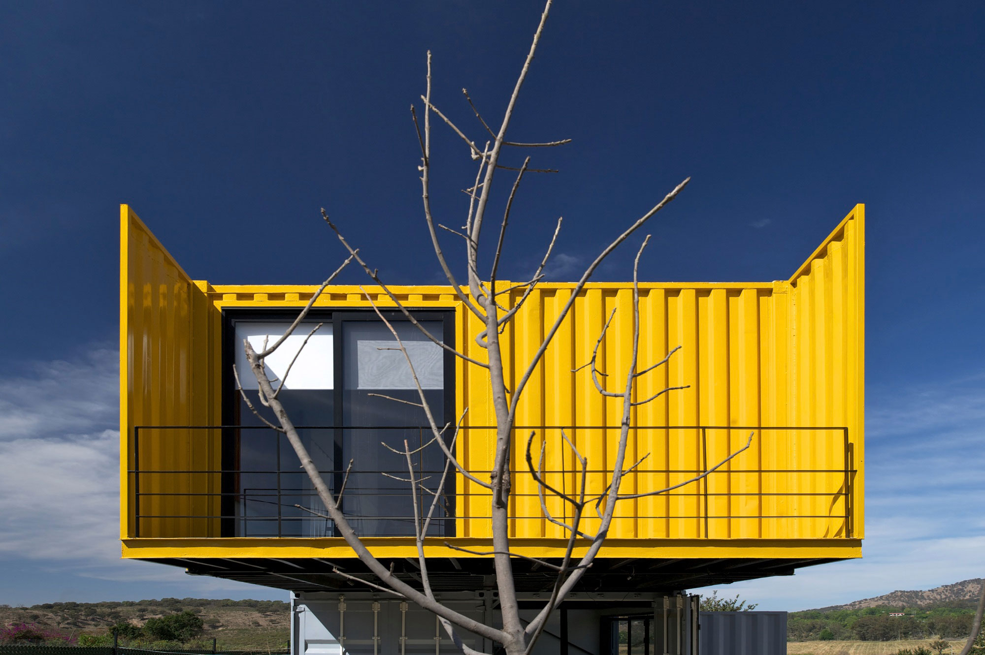 A Stylish Contemporary House Made of Four Shipping Containers in the Primavera Forest by S+ Diseño (10)