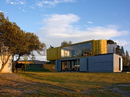 A Stylish Contemporary House Made of Four Shipping Containers in the Primavera Forest by S+ Diseño (3)