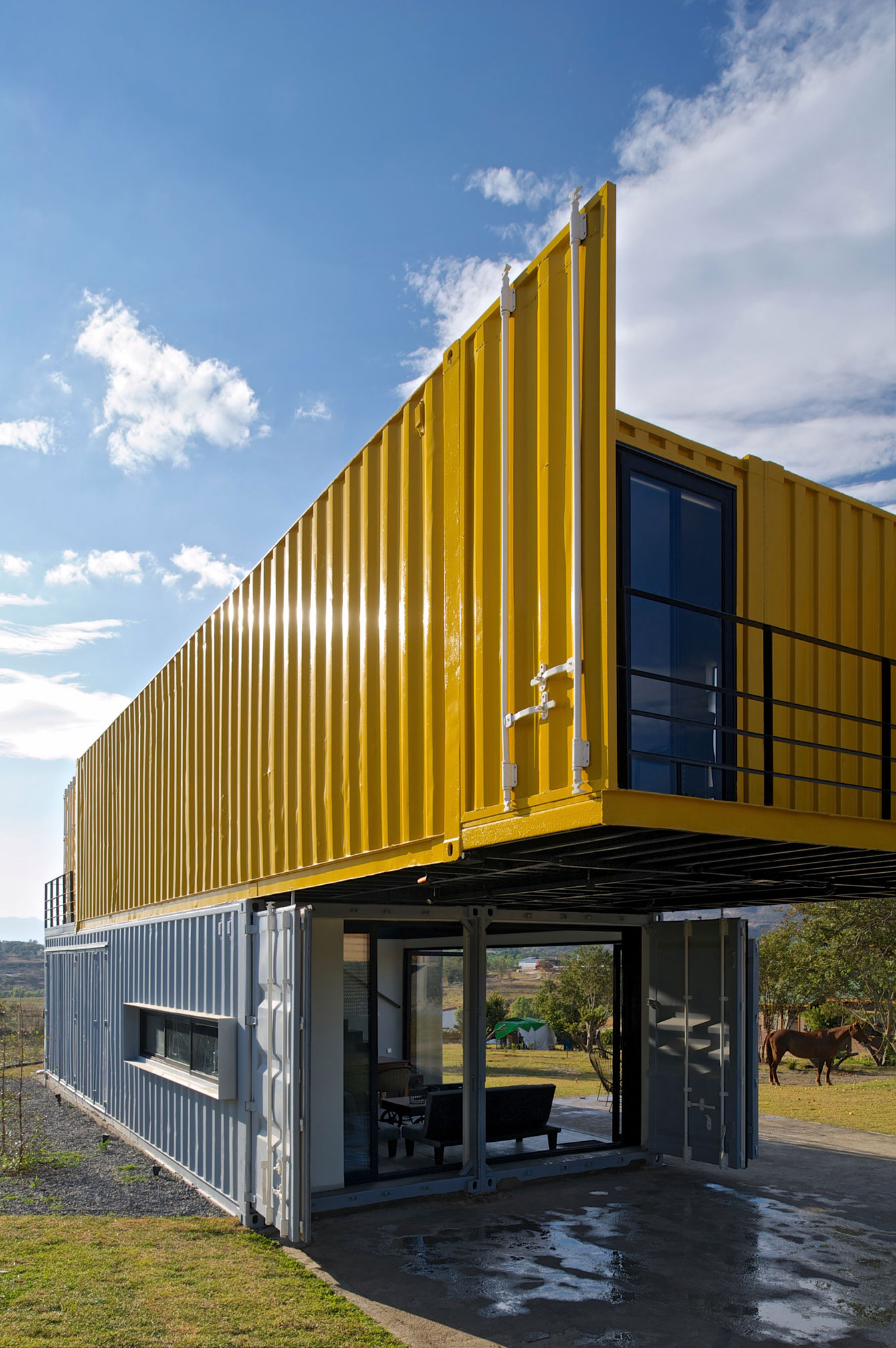 A Stylish Contemporary House Made of Four Shipping Containers in the Primavera Forest by S+ Diseño (7)