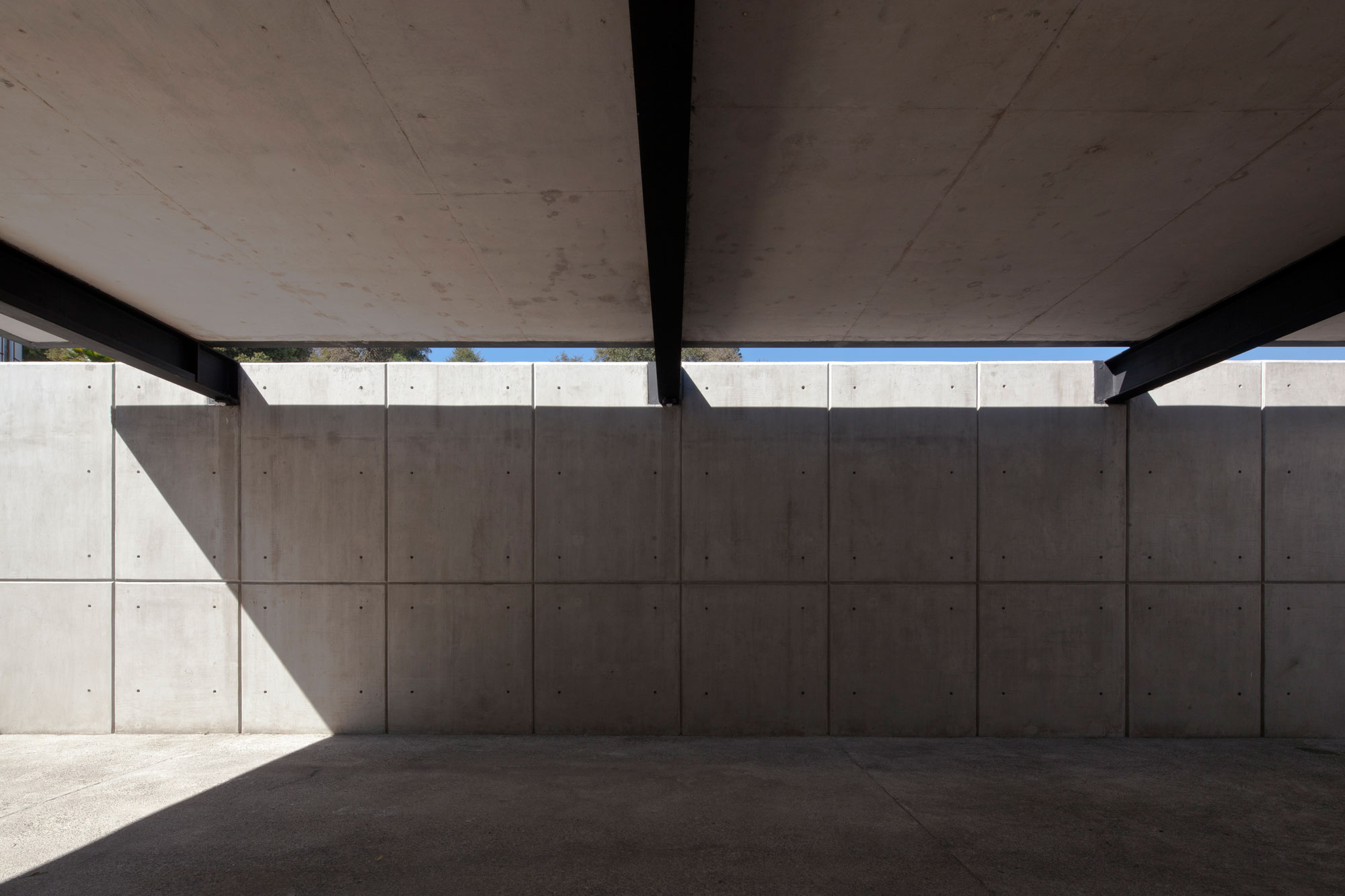 A Contemporary House Made of Wood, Concrete and Volcanic Stone in Mexico City by Materia Arquitectonica (10)