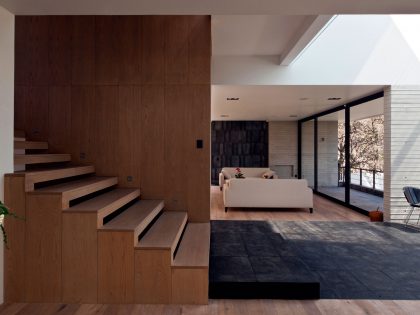 A Contemporary House Made of Wood, Concrete and Volcanic Stone in Mexico City by Materia Arquitectonica (17)