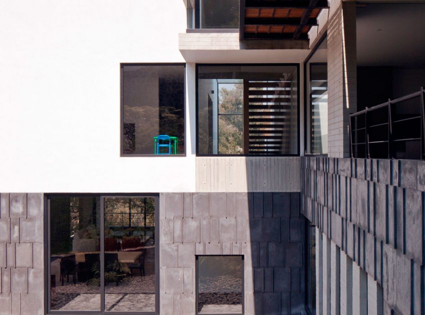 A Contemporary House Made of Wood, Concrete and Volcanic Stone in Mexico City by Materia Arquitectonica (7)