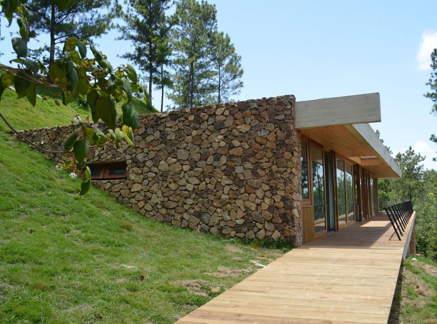 A Contemporary House with Exposed Concrete Walls and Excavated Rock in Dominican Republic by VASHO (1)