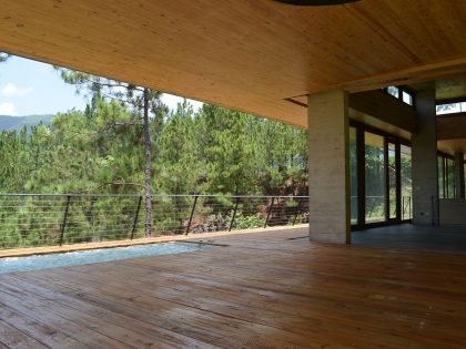 A Contemporary House with Exposed Concrete Walls and Excavated Rock in Dominican Republic by VASHO (11)