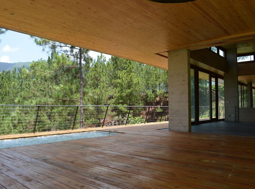 A Contemporary House with Exposed Concrete Walls and Excavated Rock in Dominican Republic by VASHO (11)