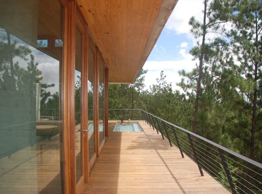 A Contemporary House with Exposed Concrete Walls and Excavated Rock in Dominican Republic by VASHO (12)