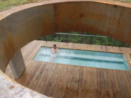 A Contemporary House with Exposed Concrete Walls and Excavated Rock in Dominican Republic by VASHO (14)