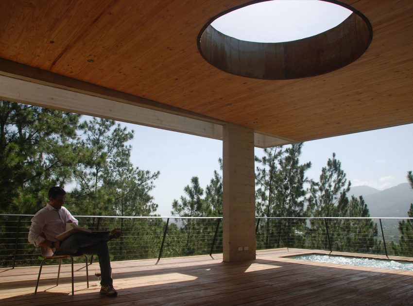 A Contemporary House with Exposed Concrete Walls and Excavated Rock in Dominican Republic by VASHO (16)