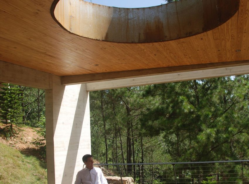 A Contemporary House with Exposed Concrete Walls and Excavated Rock in Dominican Republic by VASHO (17)