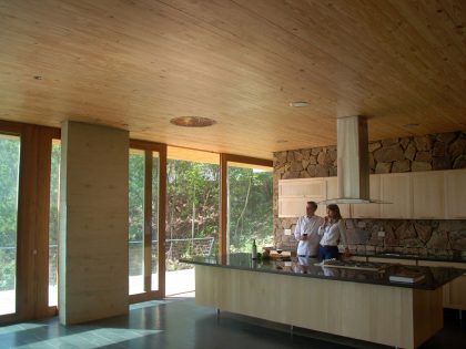 A Contemporary House with Exposed Concrete Walls and Excavated Rock in Dominican Republic by VASHO (19)