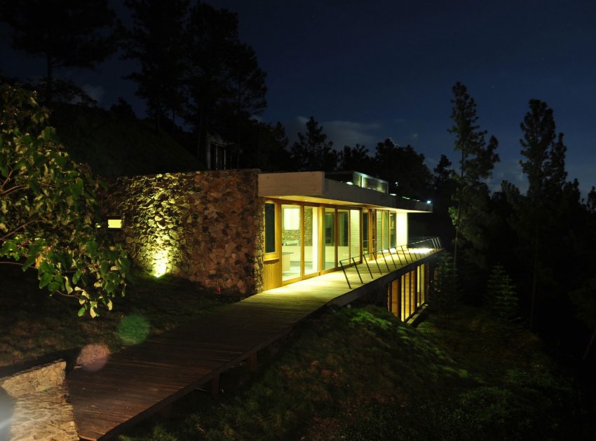 A Contemporary House with Exposed Concrete Walls and Excavated Rock in Dominican Republic by VASHO (22)