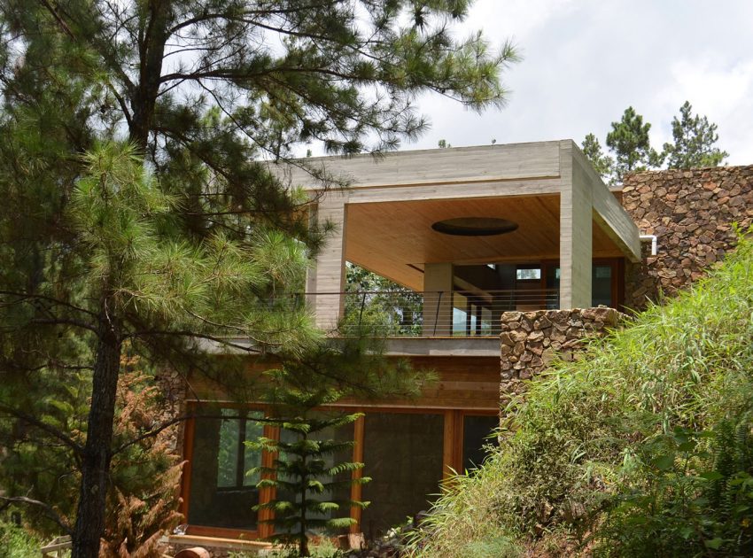 A Contemporary House with Exposed Concrete Walls and Excavated Rock in Dominican Republic by VASHO (4)