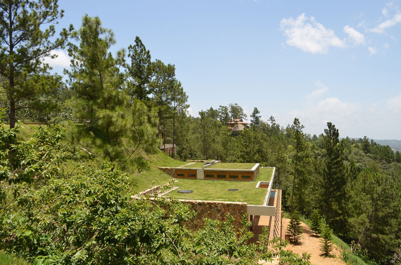 A Contemporary House with Exposed Concrete Walls and Excavated Rock in Dominican Republic by VASHO (5)
