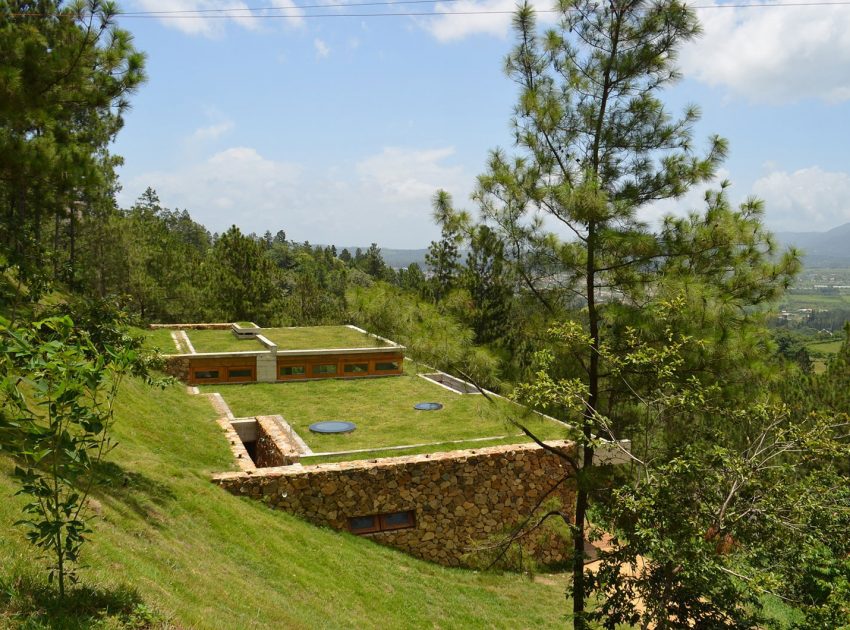 A Contemporary House with Exposed Concrete Walls and Excavated Rock in Dominican Republic by VASHO (6)