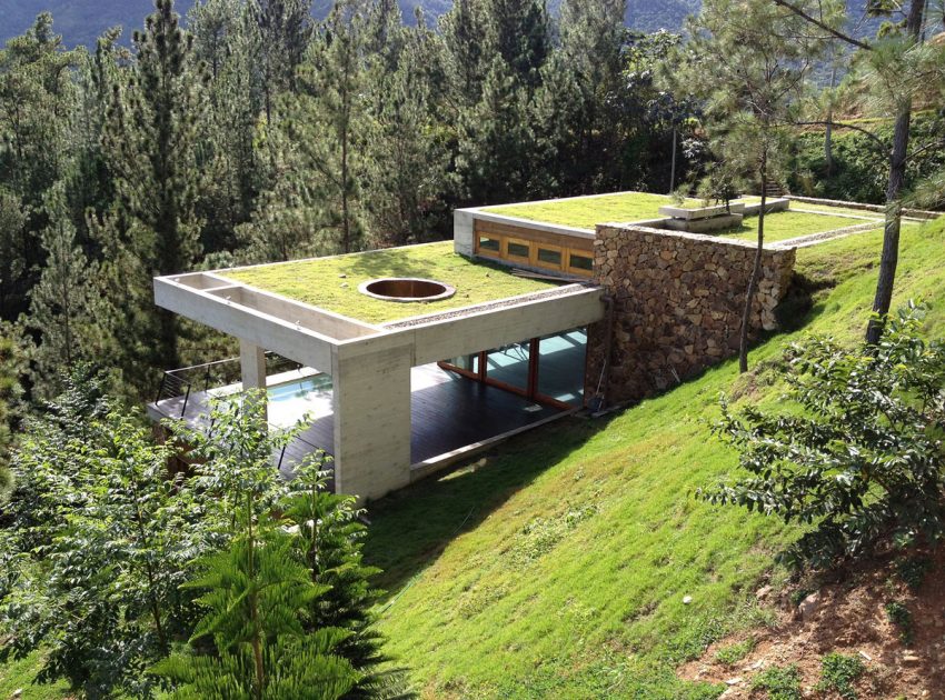 A Contemporary House with Exposed Concrete Walls and Excavated Rock in Dominican Republic by VASHO (7)