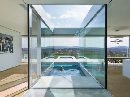 A Contemporary House with Lots of Glass, Steel and Concrete in Thuringia, Germany by Paul de Ruiter Architects (10)