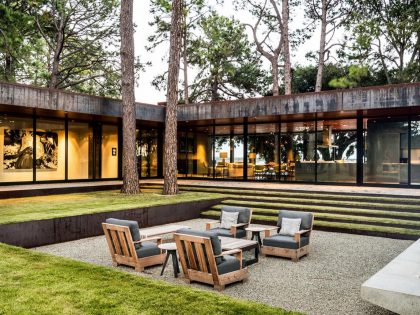 A Contemporary Lakefront Home with Concrete and Weathering Steel in Cedar Creek Reservoir