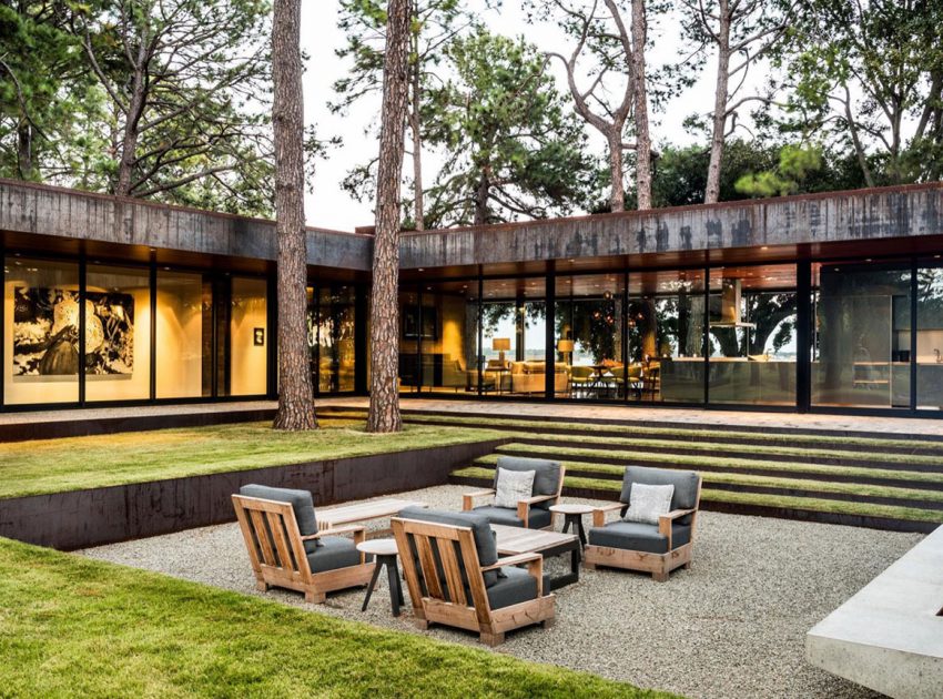 A Contemporary Lakefront Home with Concrete and Weathering Steel in Cedar Creek Reservoir by Wernerfield (1)