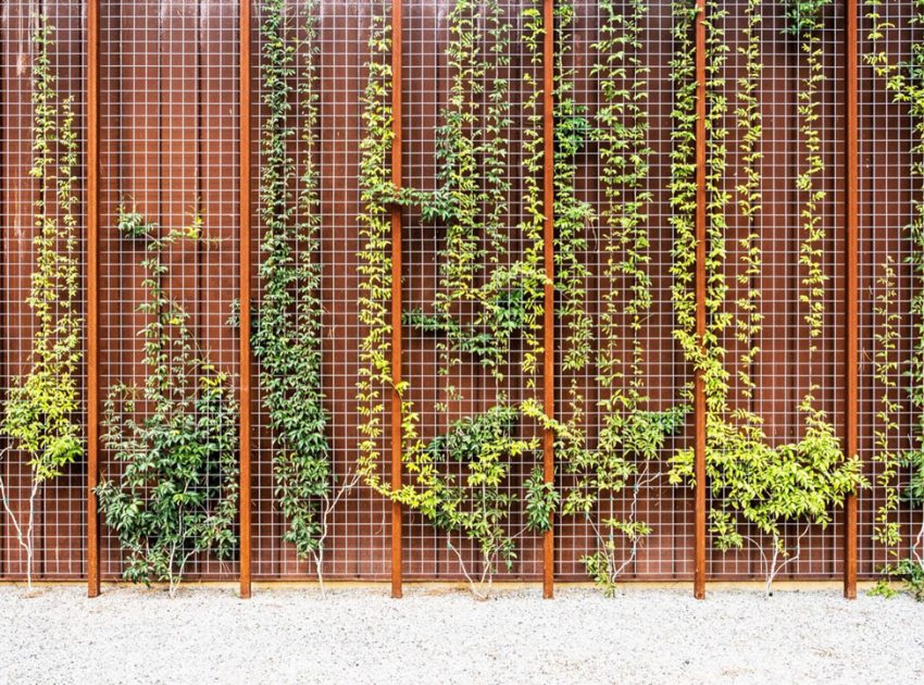 A Contemporary Lakefront Home with Concrete and Weathering Steel in Cedar Creek Reservoir by Wernerfield (12)