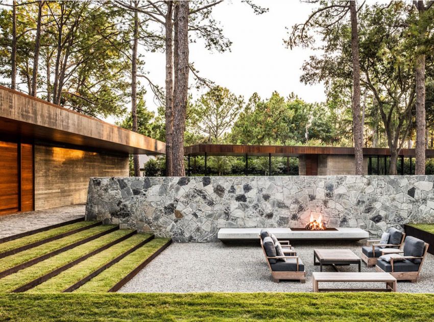 A Contemporary Lakefront Home with Concrete and Weathering Steel in Cedar Creek Reservoir by Wernerfield (2)