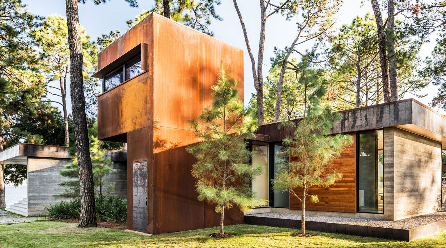 A Contemporary Lakefront Home with Concrete and Weathering Steel in Cedar Creek Reservoir by Wernerfield (9)