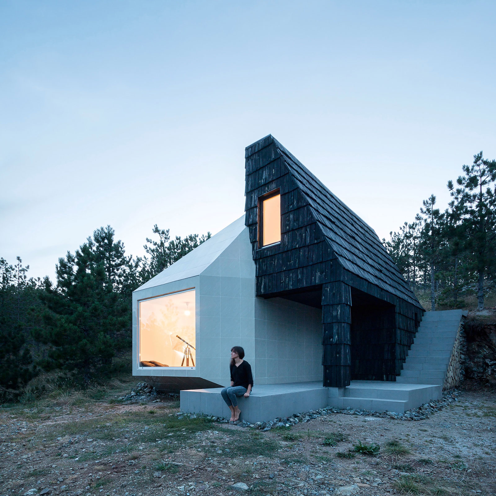 A Contemporary Mountain Home Enclosed by White Ceramic Tiles and Dark Wooden Shingles in Divčibare by EXE studio (10)