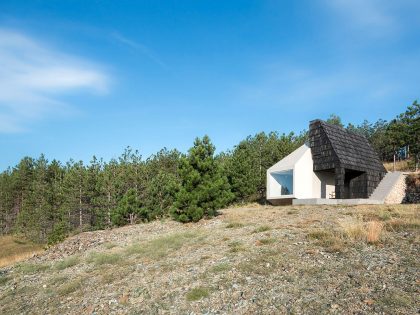 A Contemporary Mountain Home Enclosed by White Ceramic Tiles and Dark Wooden Shingles in Divčibare by EXE studio (3)