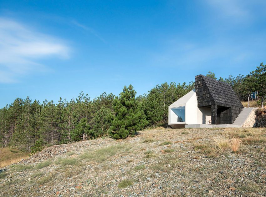 A Contemporary Mountain Home Enclosed by White Ceramic Tiles and Dark Wooden Shingles in Divčibare by EXE studio (3)