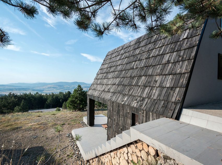 A Contemporary Mountain Home Enclosed by White Ceramic Tiles and Dark Wooden Shingles in Divčibare by EXE studio (4)