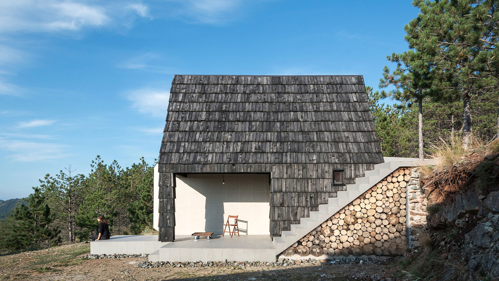 A Contemporary Mountain Home Enclosed by White Ceramic Tiles and Dark Wooden Shingles in Divčibare by EXE studio (5)