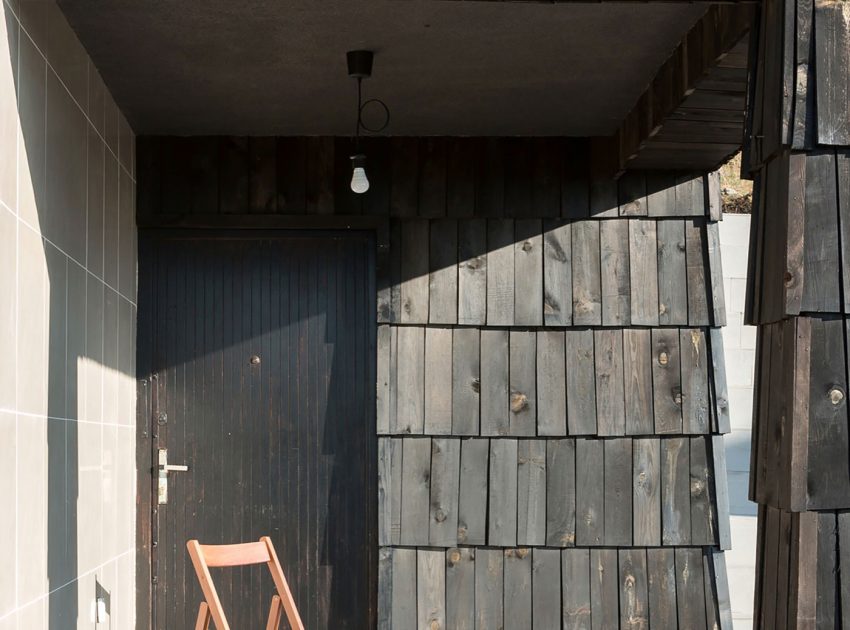 A Contemporary Mountain Home Enclosed by White Ceramic Tiles and Dark Wooden Shingles in Divčibare by EXE studio (6)