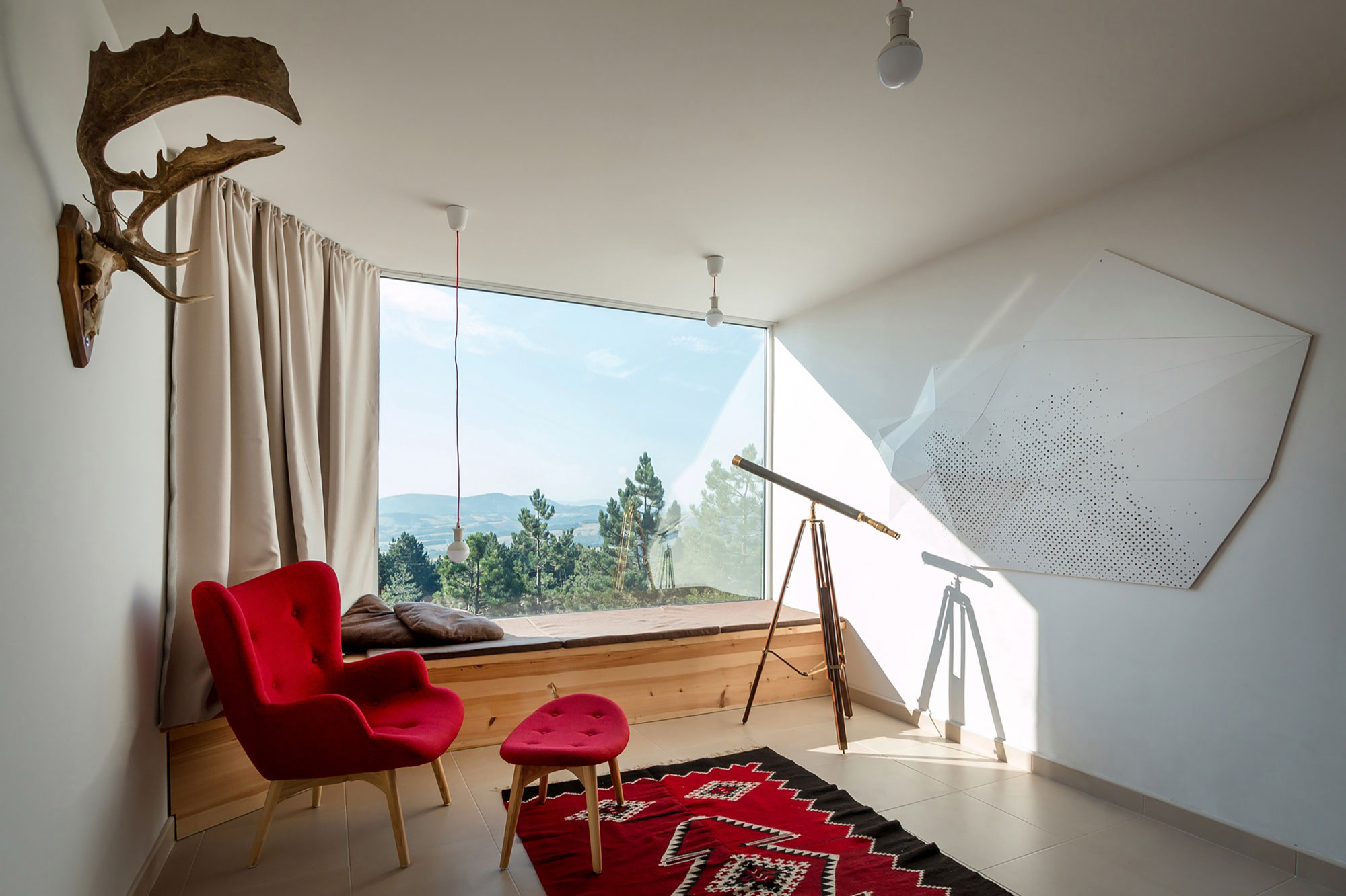 A Contemporary Mountain Home Enclosed by White Ceramic Tiles and Dark Wooden Shingles in Divčibare by EXE studio (7)