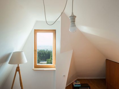 A Contemporary Mountain Home Enclosed by White Ceramic Tiles and Dark Wooden Shingles in Divčibare by EXE studio (9)