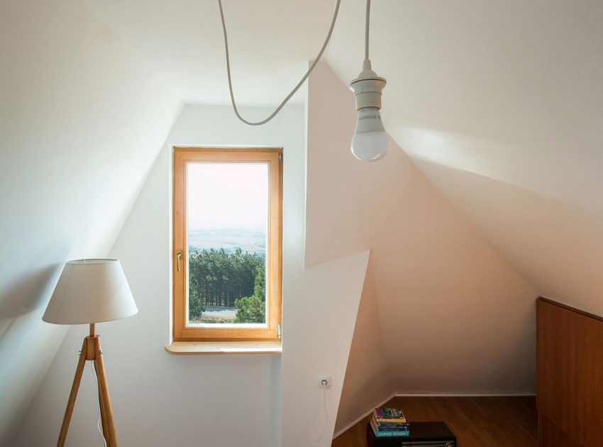 A Contemporary Mountain Home Enclosed by White Ceramic Tiles and Dark Wooden Shingles in Divčibare by EXE studio (9)