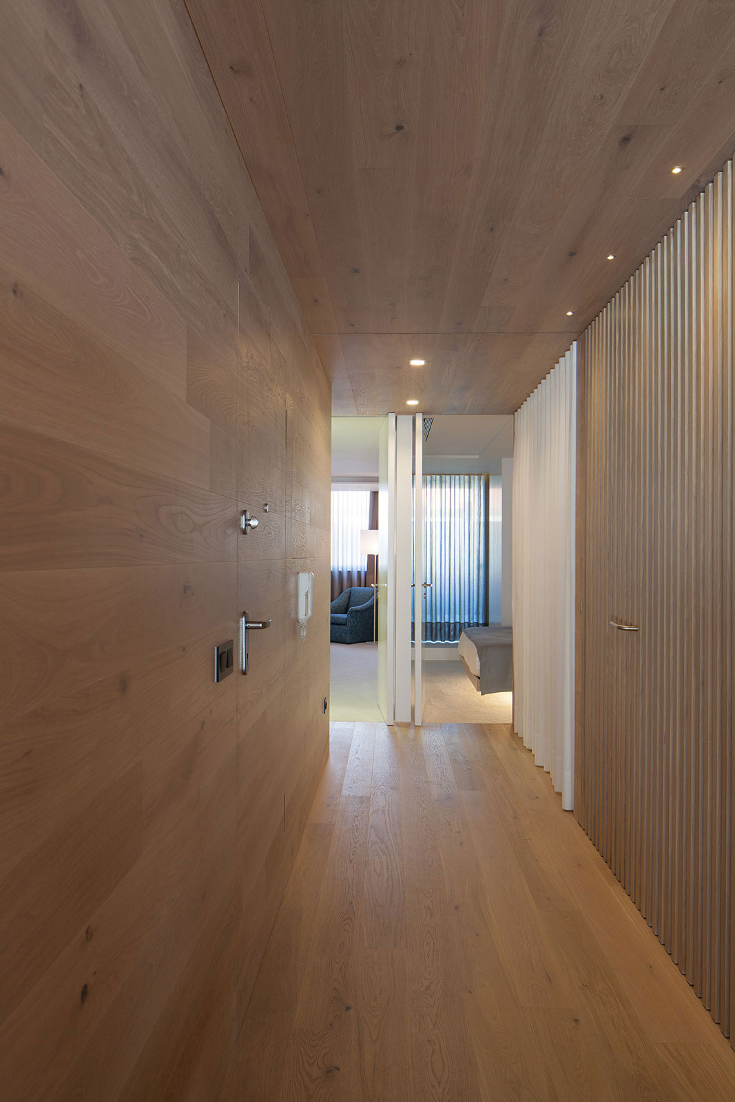 A Contemporary Seafront Apartment with Natural Wood Elements in Póvoa do Varzim by Pitagoras Group (3)