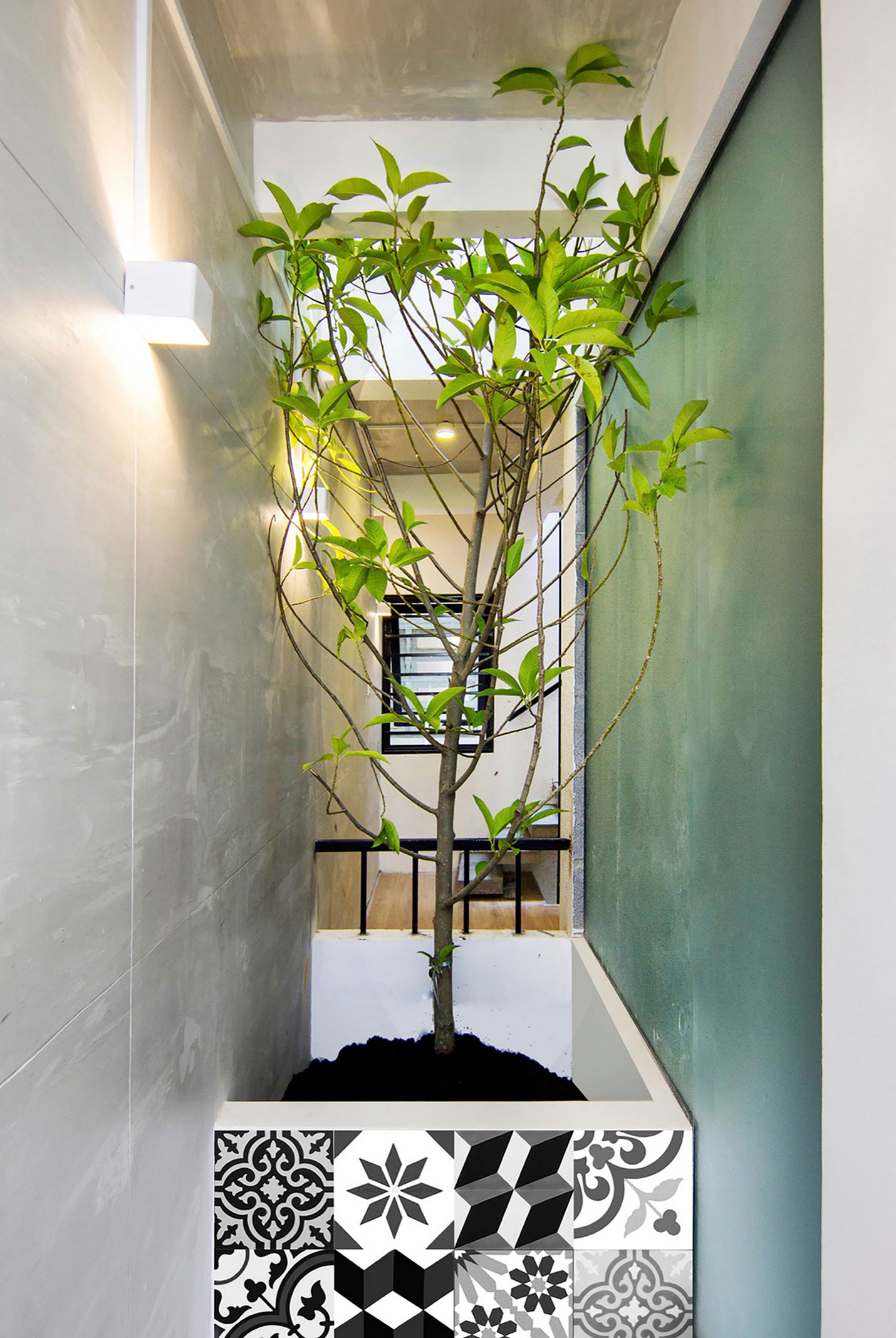 A Cozy and Comfortable Vertical Home for a Family of Four in Ho Chi Minh, Vietnam by Studio8 Vietnam (3)