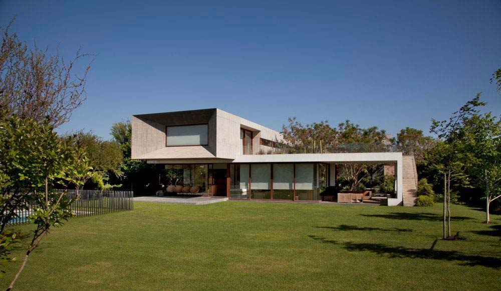 A Fascinating and Spacious Modern Concrete House with Luxurious Interiors in Chicureo, Chile by Raimundo Anguita (1)